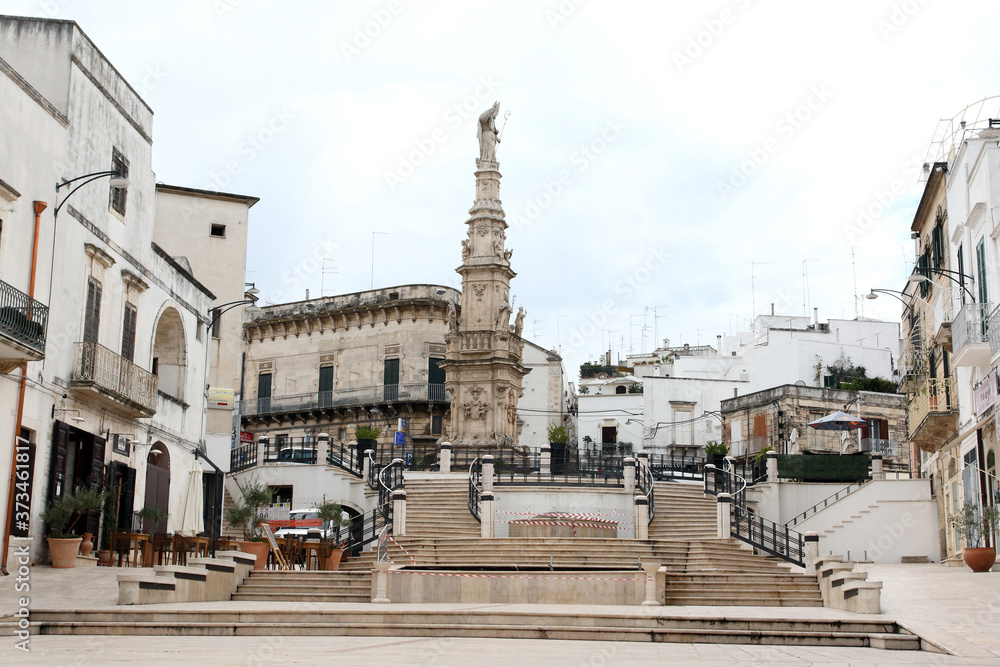 Ostuni, Italy - October 6, 2010: View of the square with the Column of Sant'Oronzo