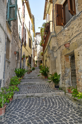 A small street between the old houses of Giuliano di Roma, of a medieval village in the Lazio region, Italy.  © Giambattista