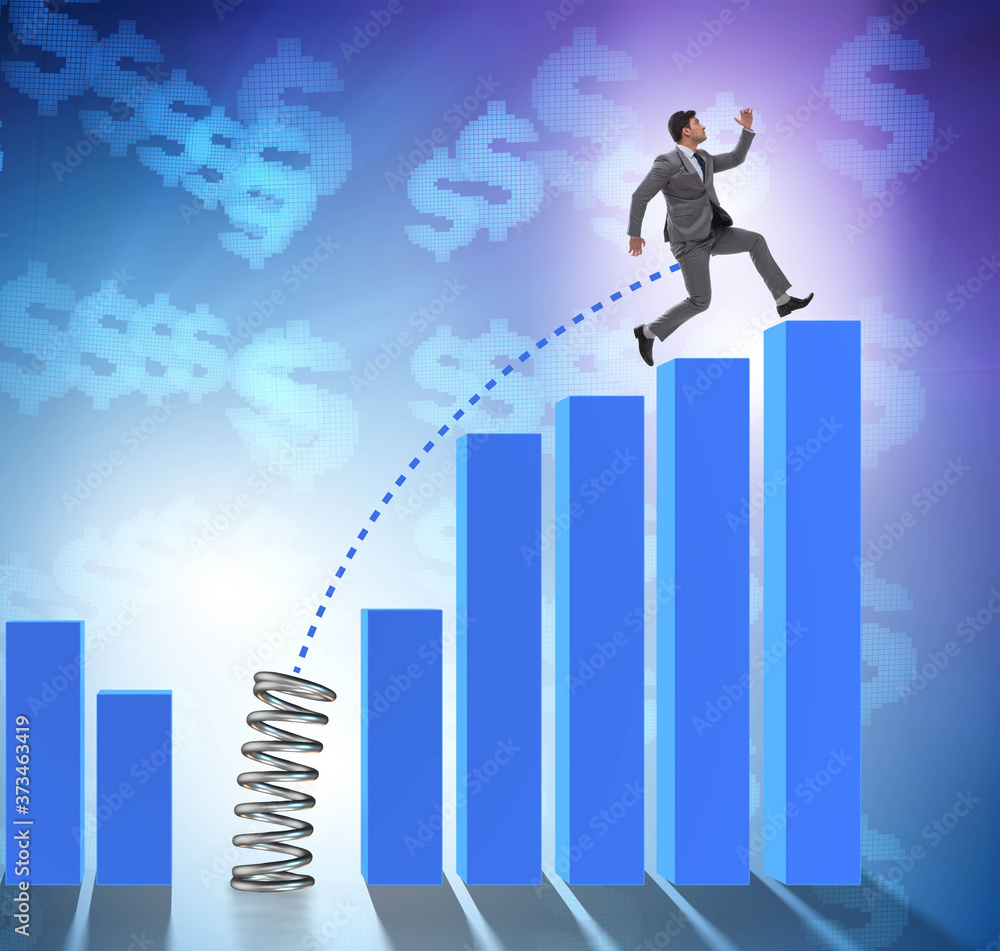Business people jumping over bar charts Business people jumping over bar charts