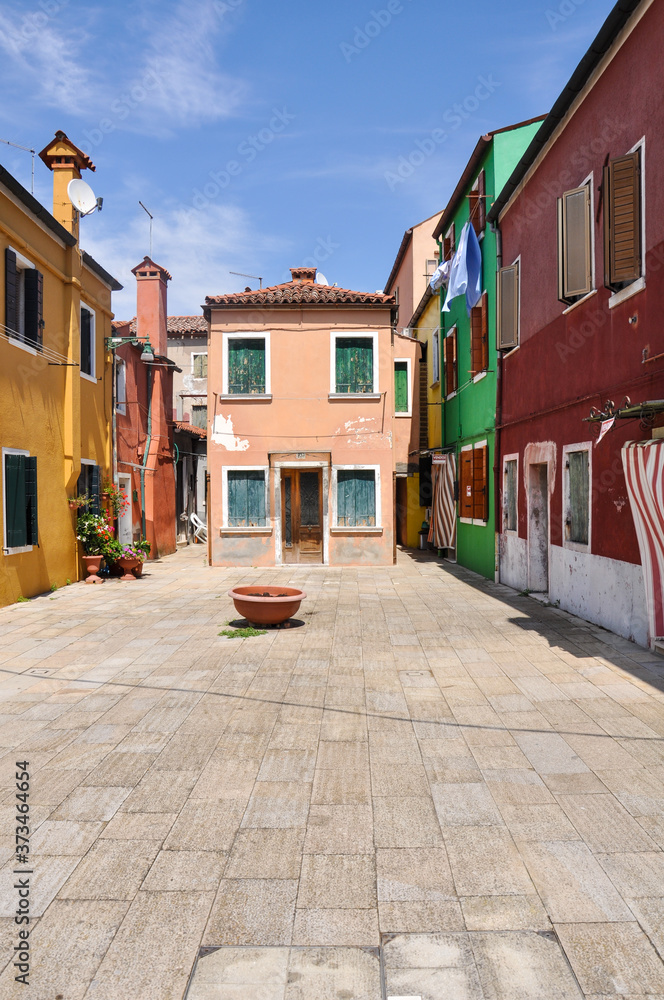 One isolated dominant house in Burano island in Venice. 