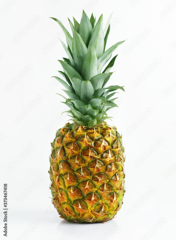 Fototapeta premium Fresh pineapple on a white background.