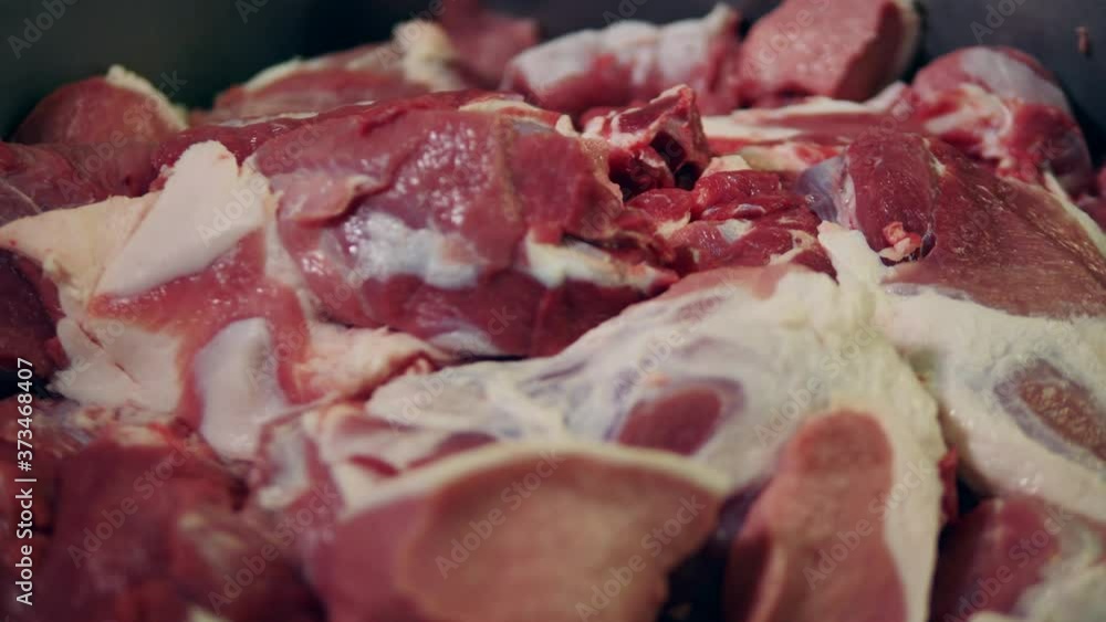 Sliced pork at meat cutting factory. Sliced pork at meat cutting factory.