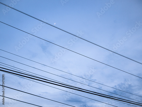 Wallpaper Mural blue sky with cloud before sunset and silhouette of cable lines Torontodigital.ca