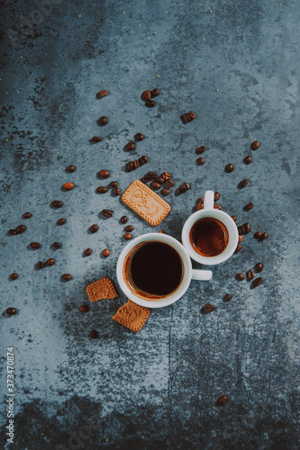Wallpaper Mural Two cups of espresso coffee. Espresso coffee beans as decoration on the textured background.
 Torontodigital.ca