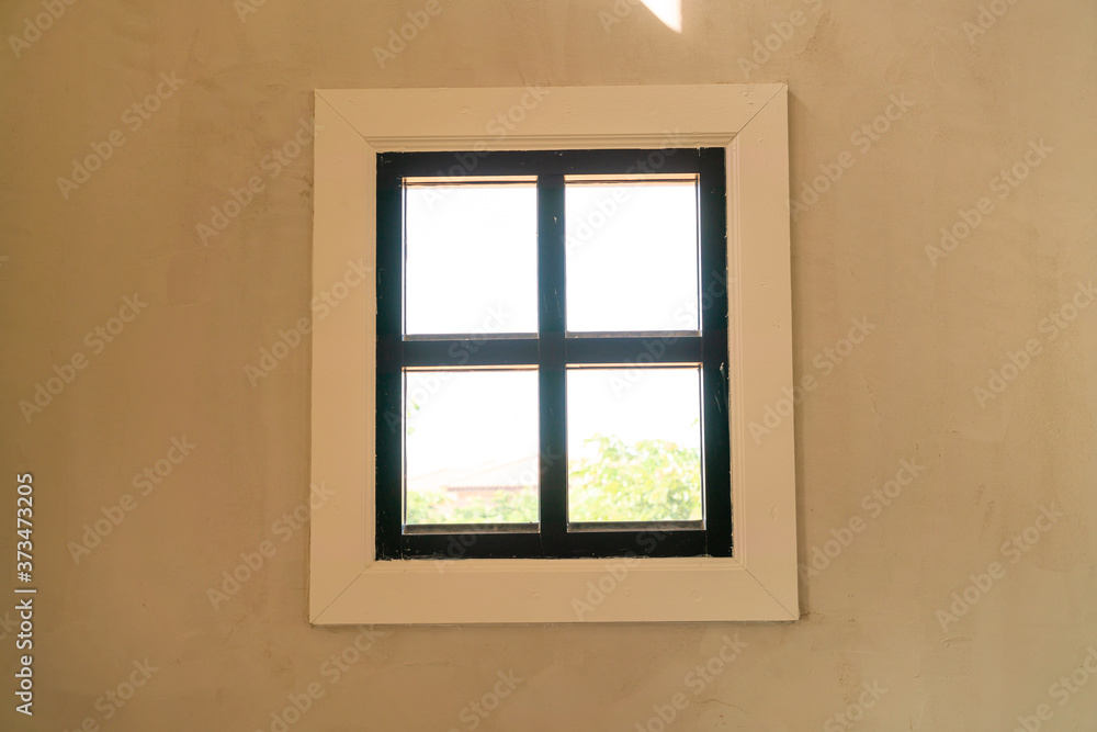 Fototapeta premium window on wall with sunlight