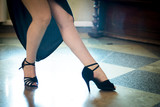 Legs of sexy woman tango dancer in pose