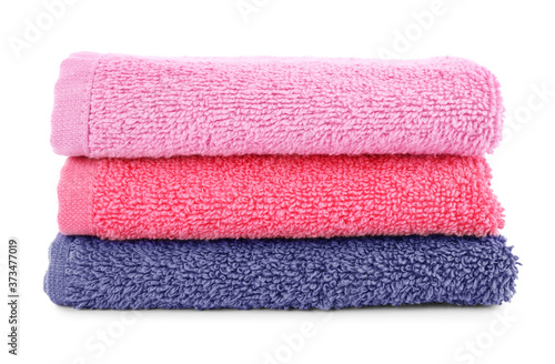 Folded soft terry towels isolated on white