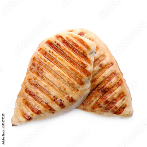 Tasty grilled chicken fillets isolated on white, top view