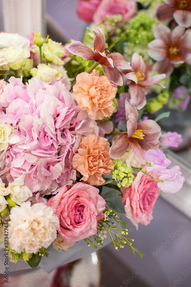 Floral bunch in round box. Bouquet in bright color of beautiful Mixed flowers. Excellent garden flowers in the arrangement , the work of a professional florist. Gift box Floral bunch in round box. Bouquet in bright color of beautiful Mixed flowers. Excellent garden flowers in the arrangement , the work of a professional florist. Gift box