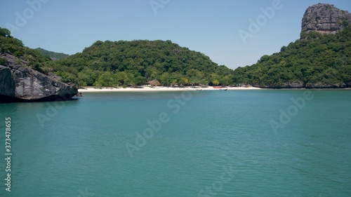Group of Islands in ocean at Ang Thong National Marine Park near touristic Samui paradise tropical resort. Archipelago in the Gulf of Thailand. Idyllic turquoise sea natural background with copy space