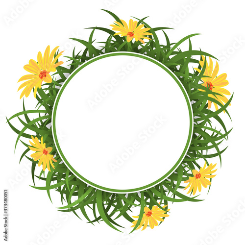 Round border with green grass and yellow daisies.