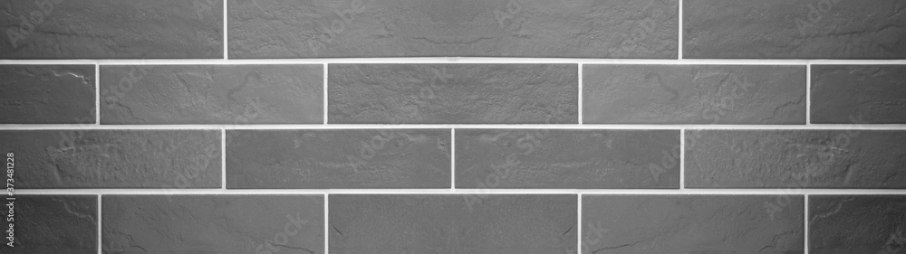 Gray grey brick tiles wall texture wide background banner panorama	