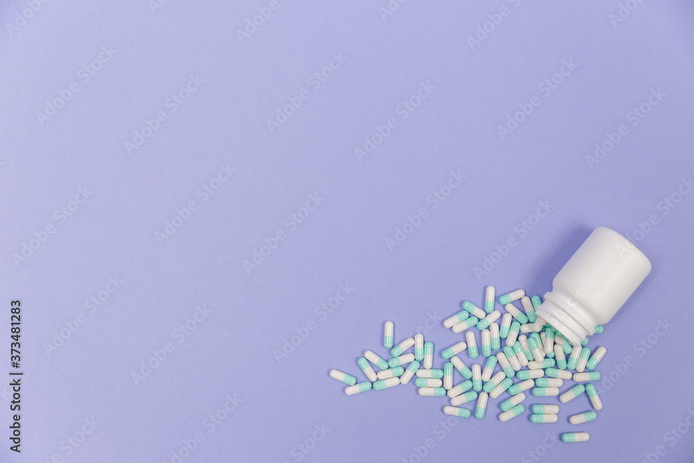 Pills spilling out of pill bottle. Pharmaceutical industry. Pharmacy. Pills spilling out of pill bottle. Pharmaceutical industry. Pharmacy.