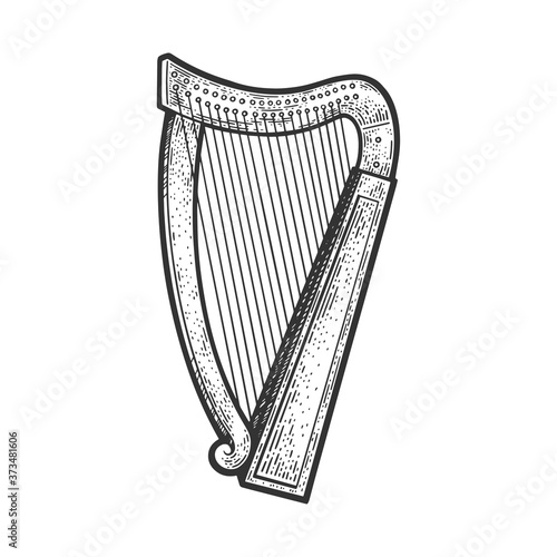 harp stringed musical instrument sketch engraving vector illustration. T-shirt apparel print design. Scratch board imitation. Black and white hand drawn image.