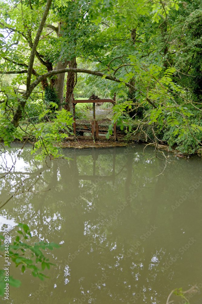 River Windrush in Cotswold town of Burford - England River Windrush in Cotswold town of Burford - England