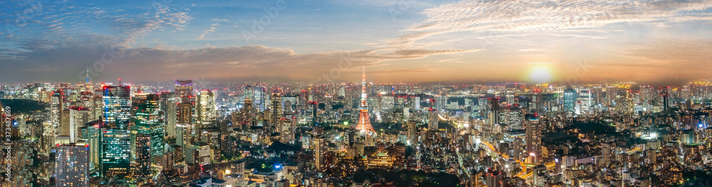 Fototapeta premium Cityscape of Tokyo skyline, panorama aerial skyscrapers view of office building and downtown in Tokyo in the evening. Japan, Asia.