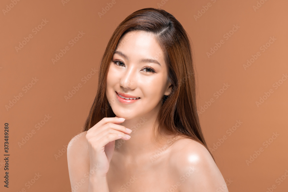 Beautiful Asian woman touching chin smile with clean and fresh skin Happiness and cheerful with positive emotional,isolated on Beige background,Beauty Cosmetics and spa Facial treatment Concept Beautiful Asian woman touching chin smile with clean and fresh skin Happiness and cheerful with positive emotional,isolated on Beige background,Beauty Cosmetics and spa Facial treatment Concept