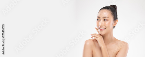 Banner of Beautiful Asian woman touching soft cheek smile with clean and fresh skin Happiness and cheerful with positive emotional,isolated on white background,Beauty and Cosmetics Concept