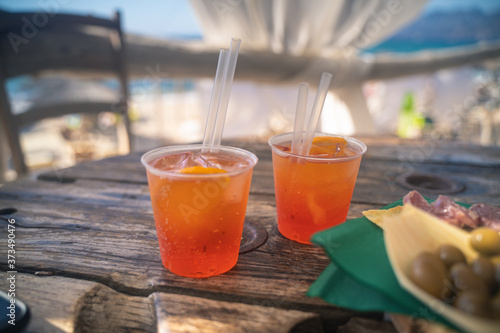 spritz with delicious snacks on the beach of Solaria, south sardinia
 photo