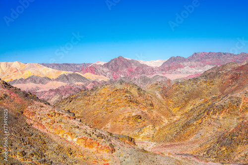 Desert mountain landscape with colorful rocks, multi-shot panorama.