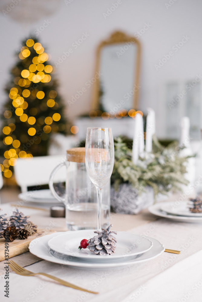 Fototapeta premium christmas, holidays and eating concept - table served for festive dinner at home