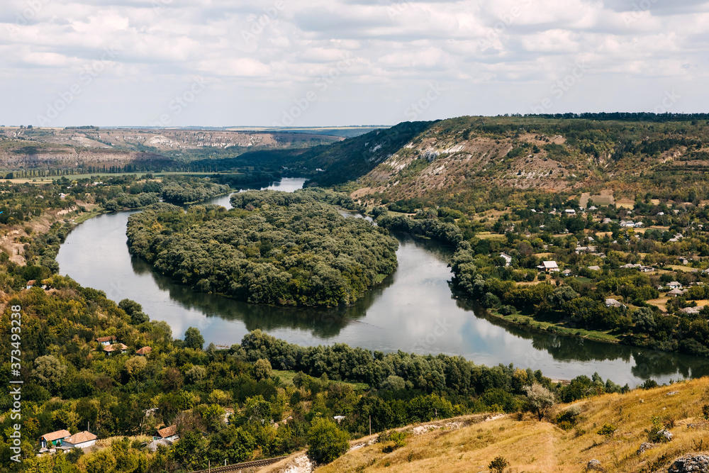 Beautiful view over a landscape of Dniester river with a heart-shaped island in the middle.