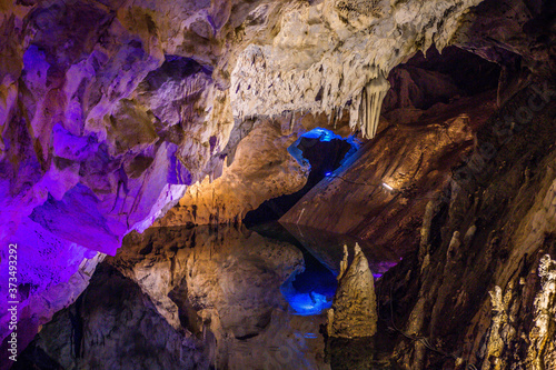 Water mirror formed in the rocky interior of a cave in the Canyon Matka of Macedonia