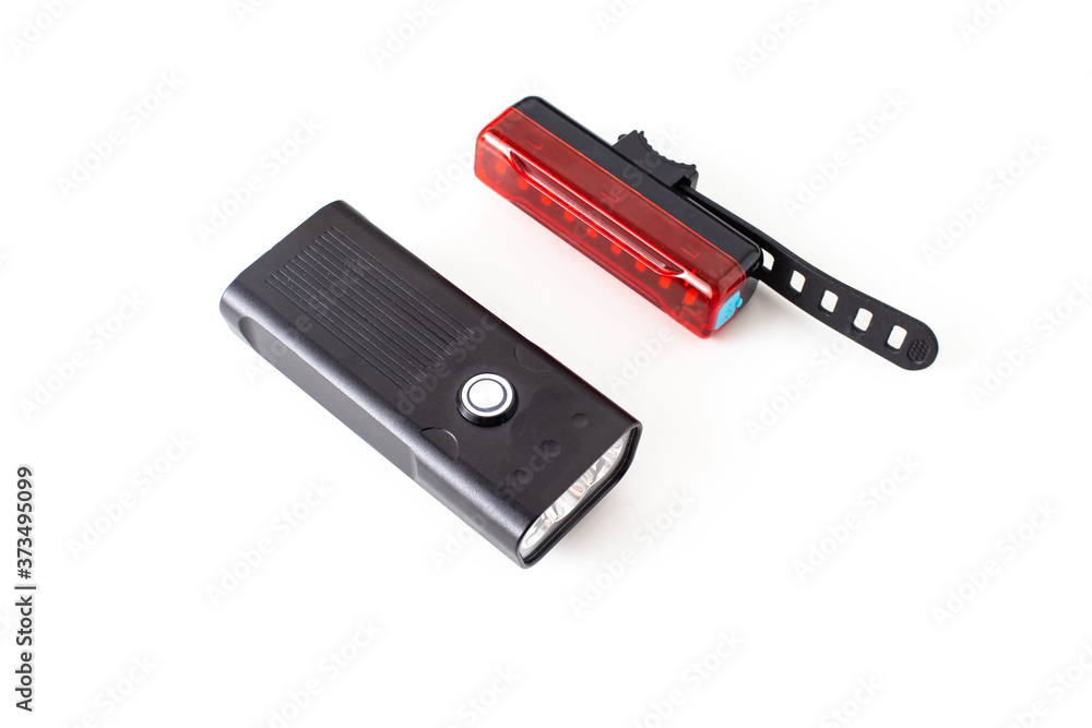 Bicycle lighting kit. Headlight and brake light for safety and illumination in the dark, white background, isolate Bicycle lighting kit. Headlight and brake light for safety and illumination in the dark, white background, isolate