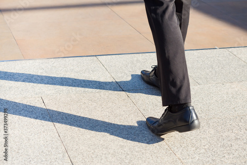 Businessman step forward also has a shadow on the floor.