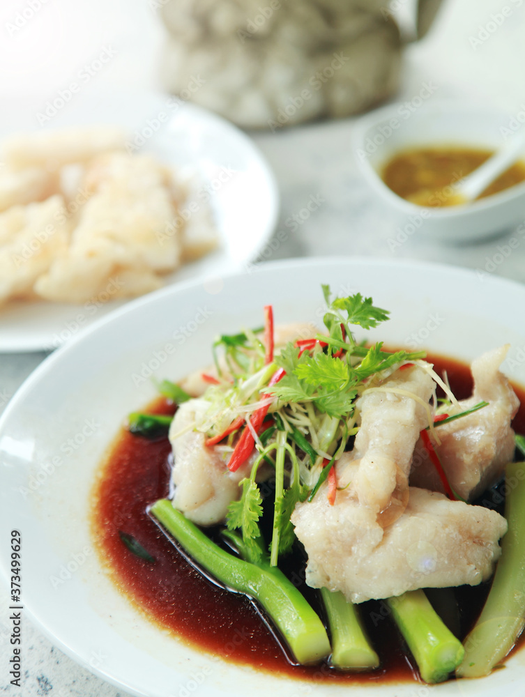 stream sea bass fillet with soy sauce. Thai food. stream sea bass fillet with soy sauce. Thai food.