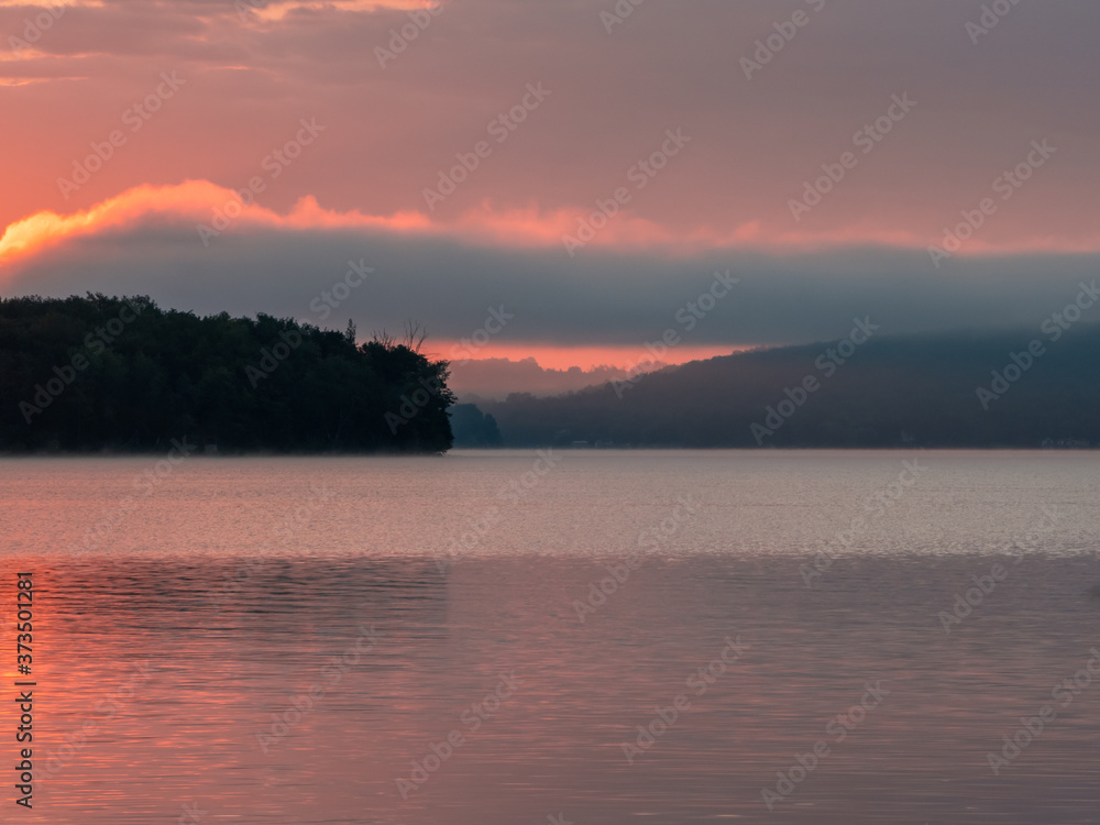 Pink sunrise on the lake