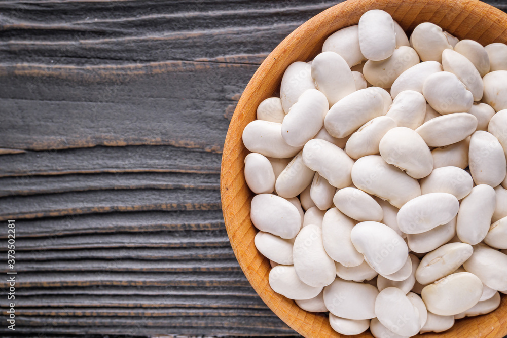 Fresh organic natural beans on wooden rustic background Fresh organic natural beans on wooden rustic background
