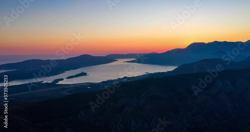 Kotor, Montenegro. Die Bucht von Kotor mit Bergen im Vordergrund und Stadt Tivat. photo
