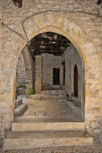A narrow street among the old houses of Vallecorsa, a medieval village in the lazio region. © Giambattista