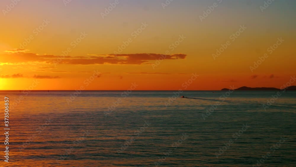 Beautiful Orange Sunrise Over Ocean Horizon, Peaceful Seascape Of Dawn reflected on ocean