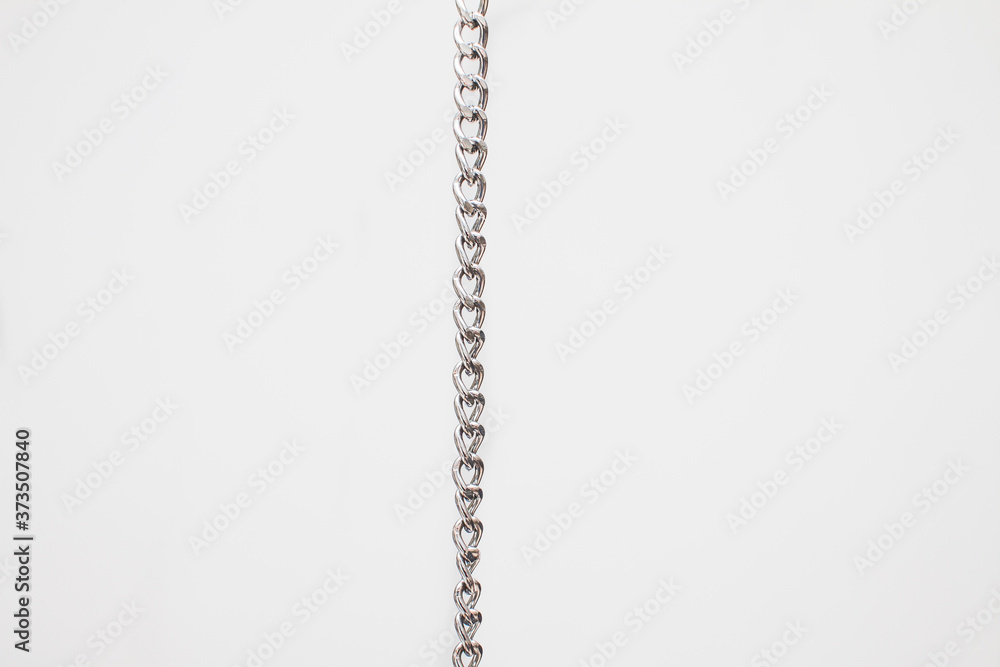 pocket silver chain vertically on white background pocket silver chain vertically on white background