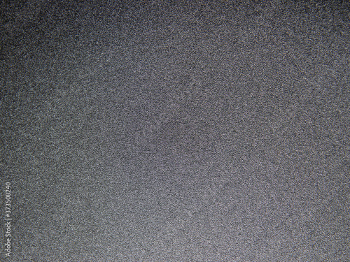 Dark grey textured grainy background