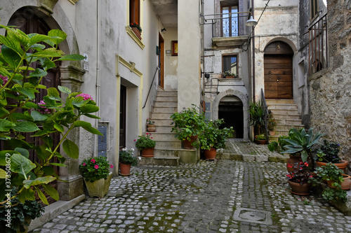 A narrow street among the old houses of Lenola  a medieval village in the Lazio region.