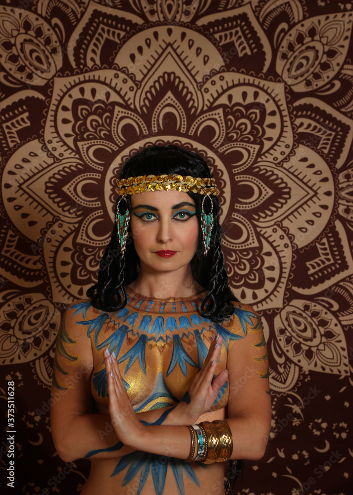 Nefertiti, Queen of Egypt. Stylized fashion.
A woman in historical clothing style.
Egyptian Priestess
