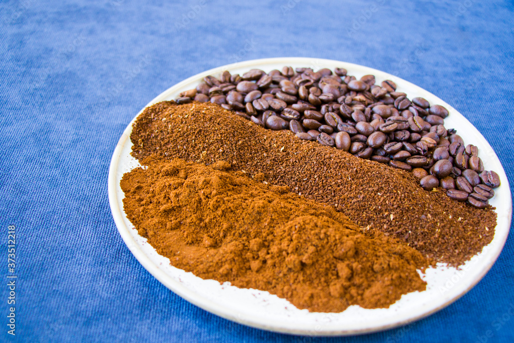 Coffee beans, seeds and roasted coffee for espresso, cappuccino and americano Coffee beans, seeds and roasted coffee for espresso, cappuccino and americano