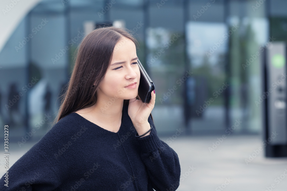 Modern business woman talking smartphone Near Open space loft office Modern business woman talking smartphone Near Open space loft office