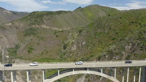 Drone Flies Backwards to Reveal Bixby Creek Bridge in Big Sur, California on Highway 1