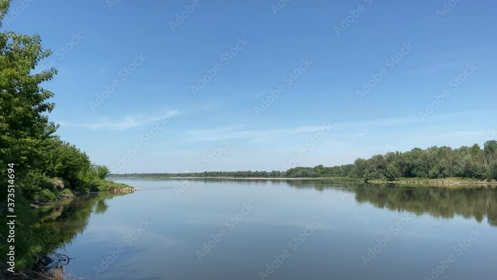 A view of the Vistula river and its other bank, green areas by the river, Poland A view of the Vistula river and its other bank, green areas by the river, Poland