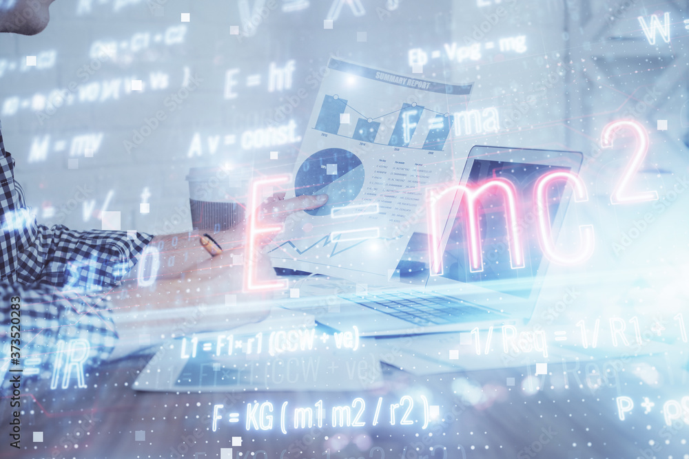 Science formula hologram with man working on computer on background. Education concept. Double exposure. Science formula hologram with man working on computer on background. Education concept. Double exposure.