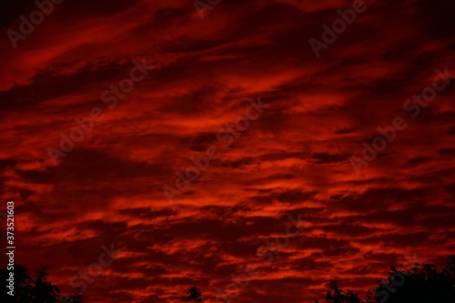 Dark red skies at sunset.
