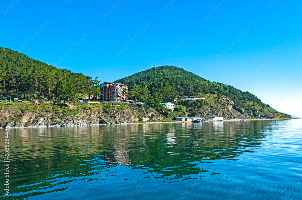 Fototapeta premium The village of Listvyanka is located on the shore of Lake Baikal is the popular tourist center on Lake Baikal.
