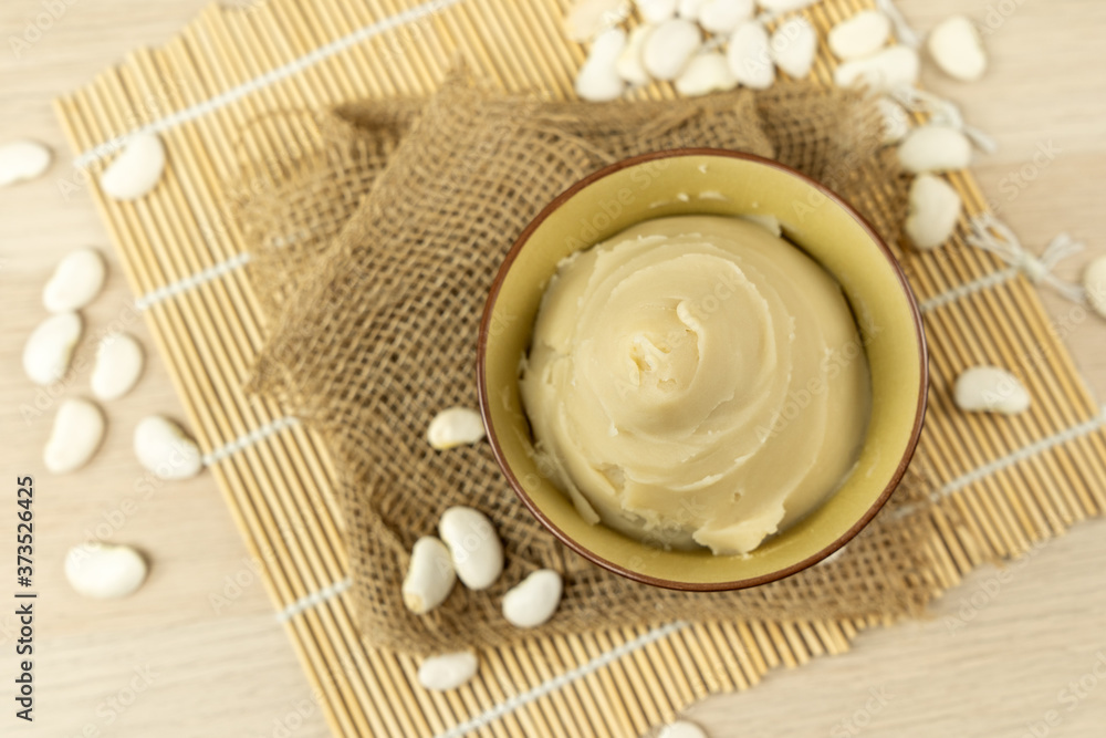 Japanese shiroan or white bean paste in a bowl, the filling used to make mochi and wagashi Japanese shiroan or white bean paste in a bowl, the filling used to make mochi and wagashi