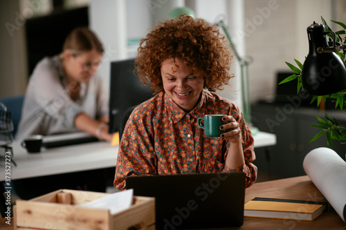 Beautiful businesswoman working on projects. Young businesswoman drinking coffee in the office.