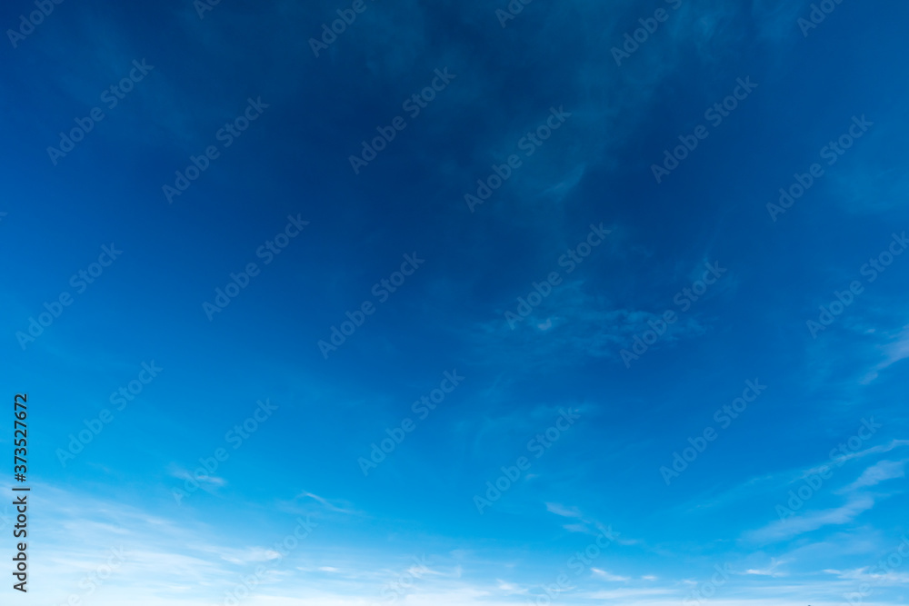 Clear sky in daytime, worm and fluffy clouds, sunny day, spring time Clear sky in daytime, worm and fluffy clouds, sunny day, spring time