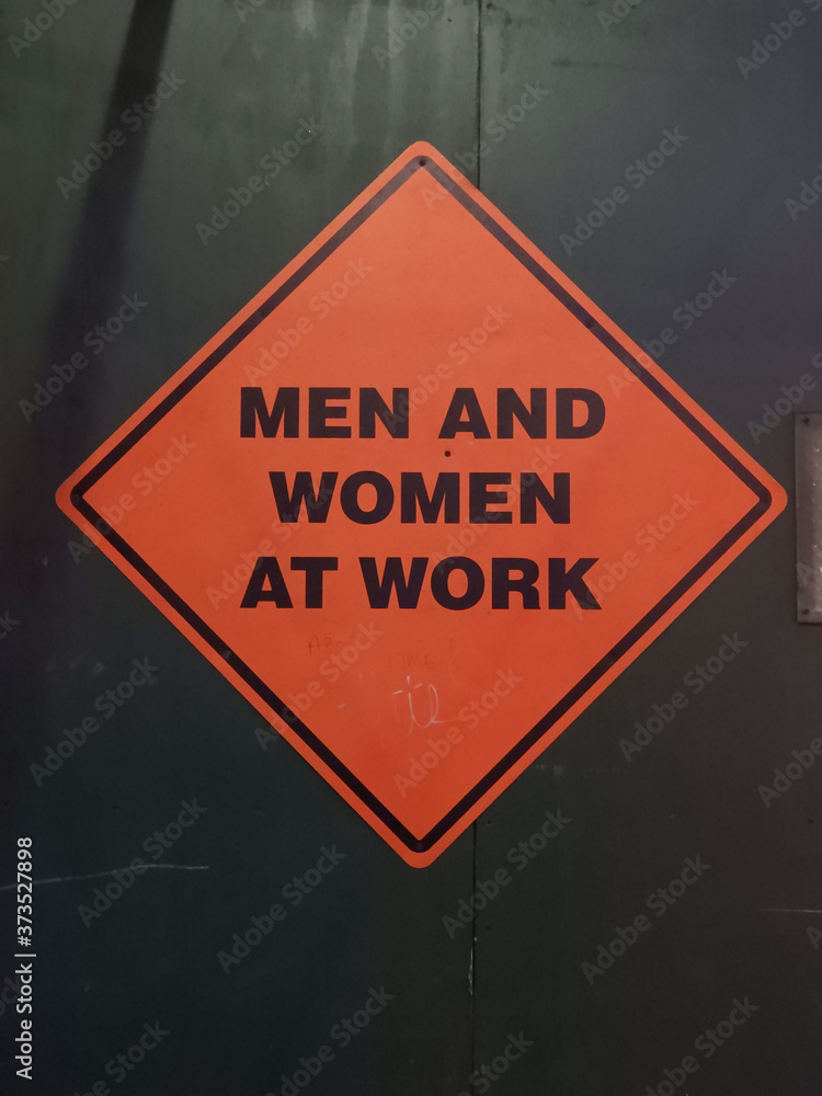 Men and Women at Work Sign